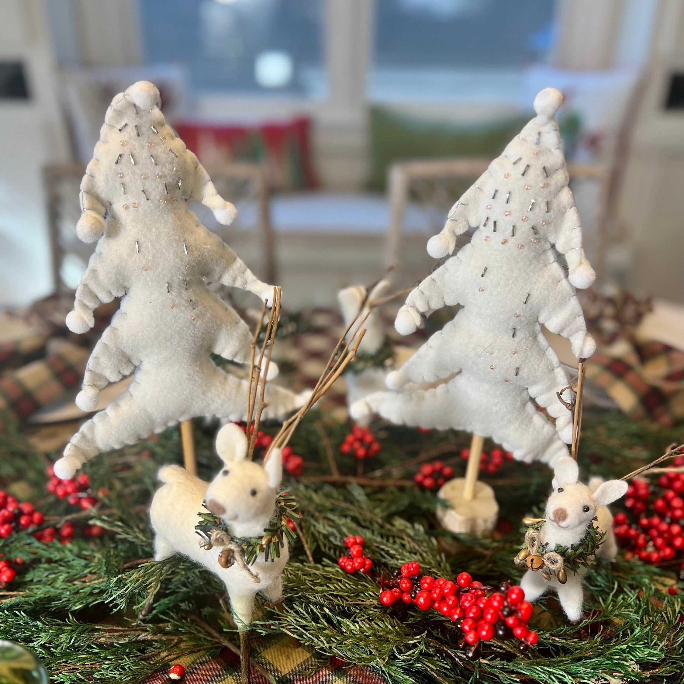 White felt Christmas tree perfect for your coffee table Christmas decor collection.