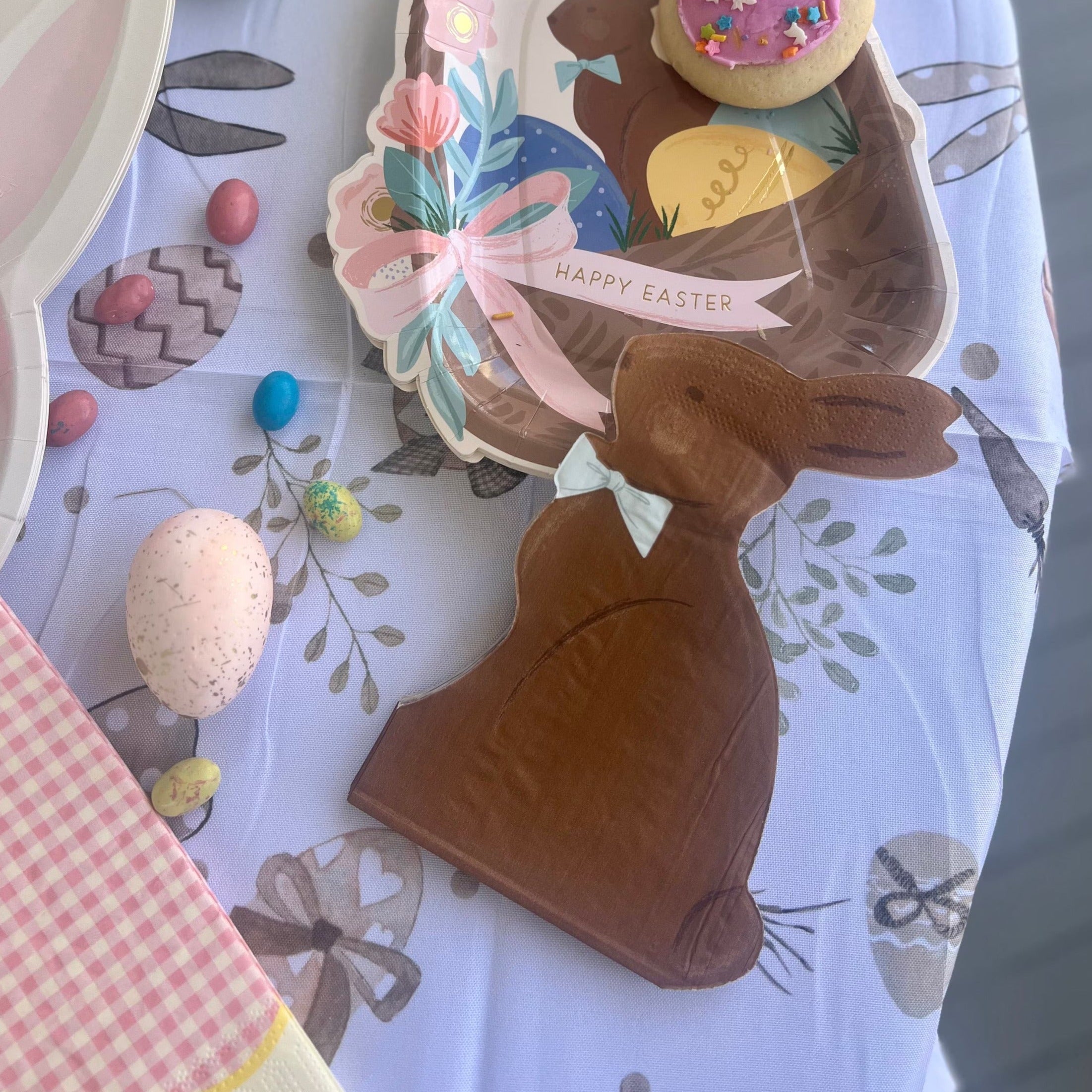A chocolate bunny shaped paper easter napkins with a cute bow tie - perfect for an easter party or an easter brunch.