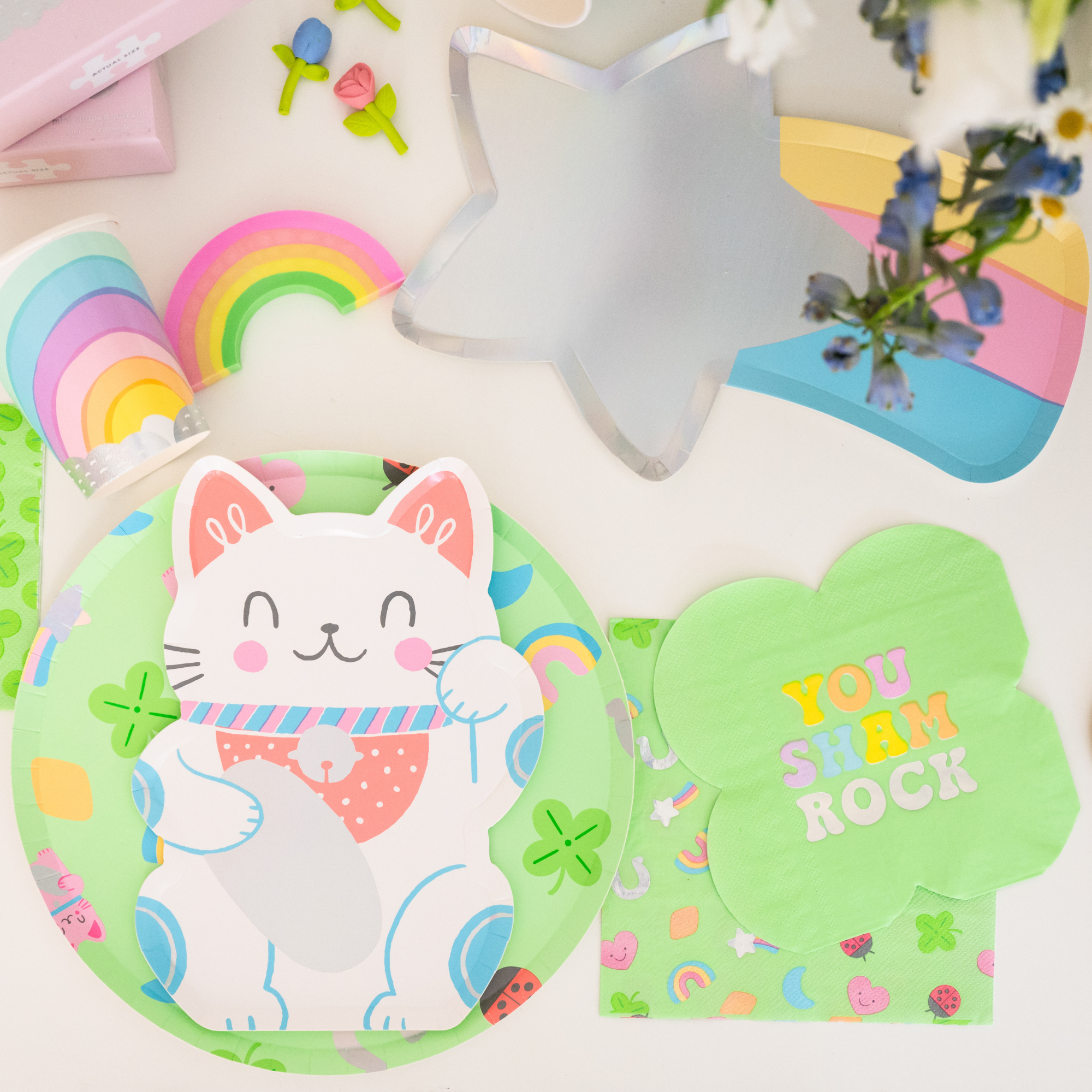St Patrick’s Day table setup with Lucky Me shooting star plates and green party accents