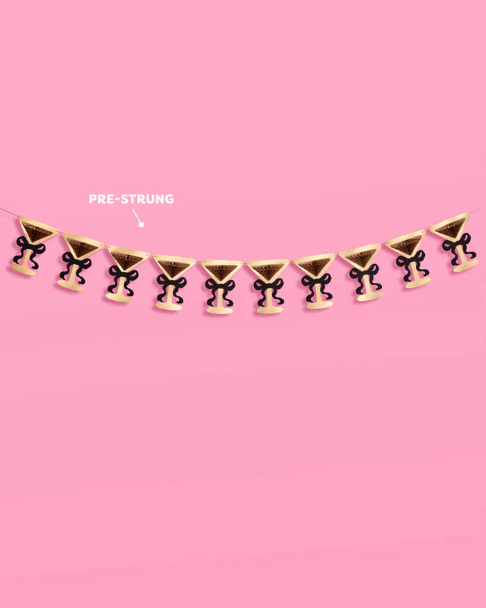 Full pre-strung martini glass banner shown against pink background with "pre-strung" callout