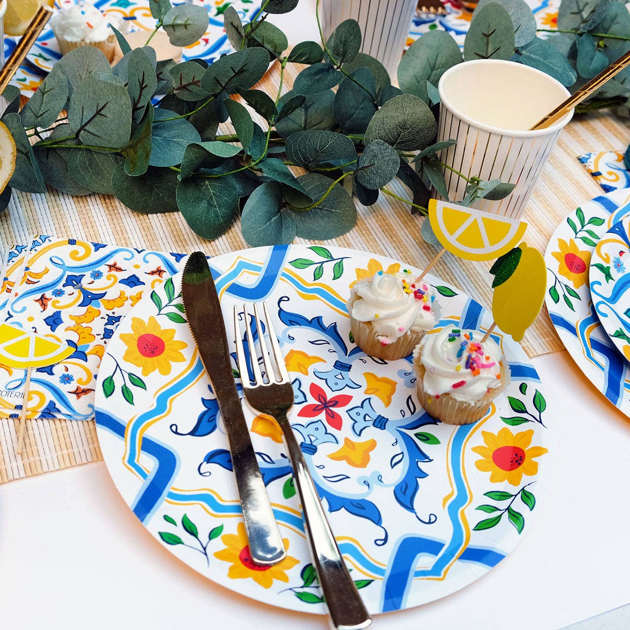 Mediterranean table setting with La Dolce Vita napkins and lemon decor