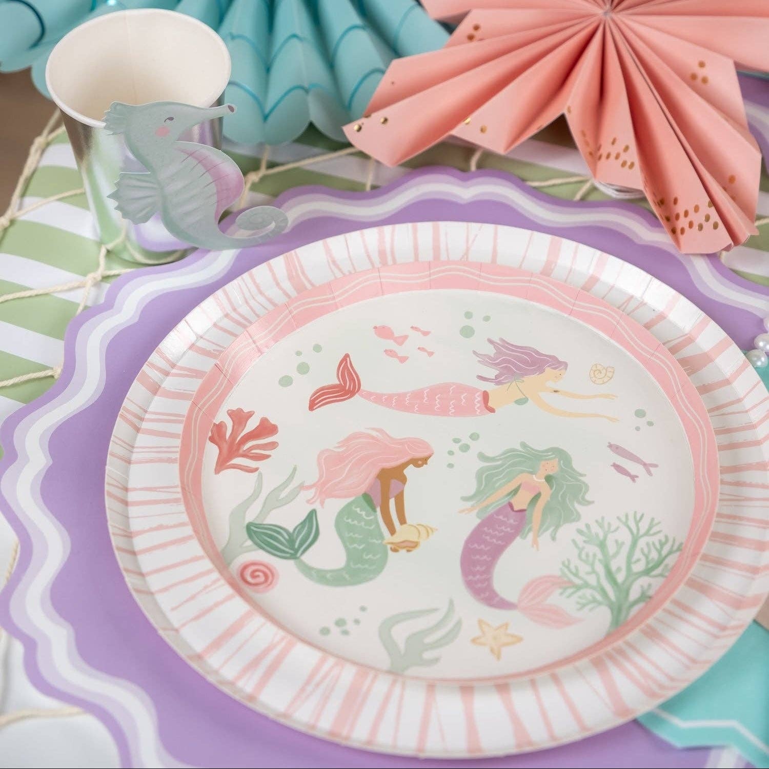 mermaid themed plate with lavender placemat and ocean party decor