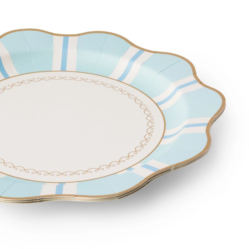 stack of mint striped paper plates showing scalloped edge and gold trim.
