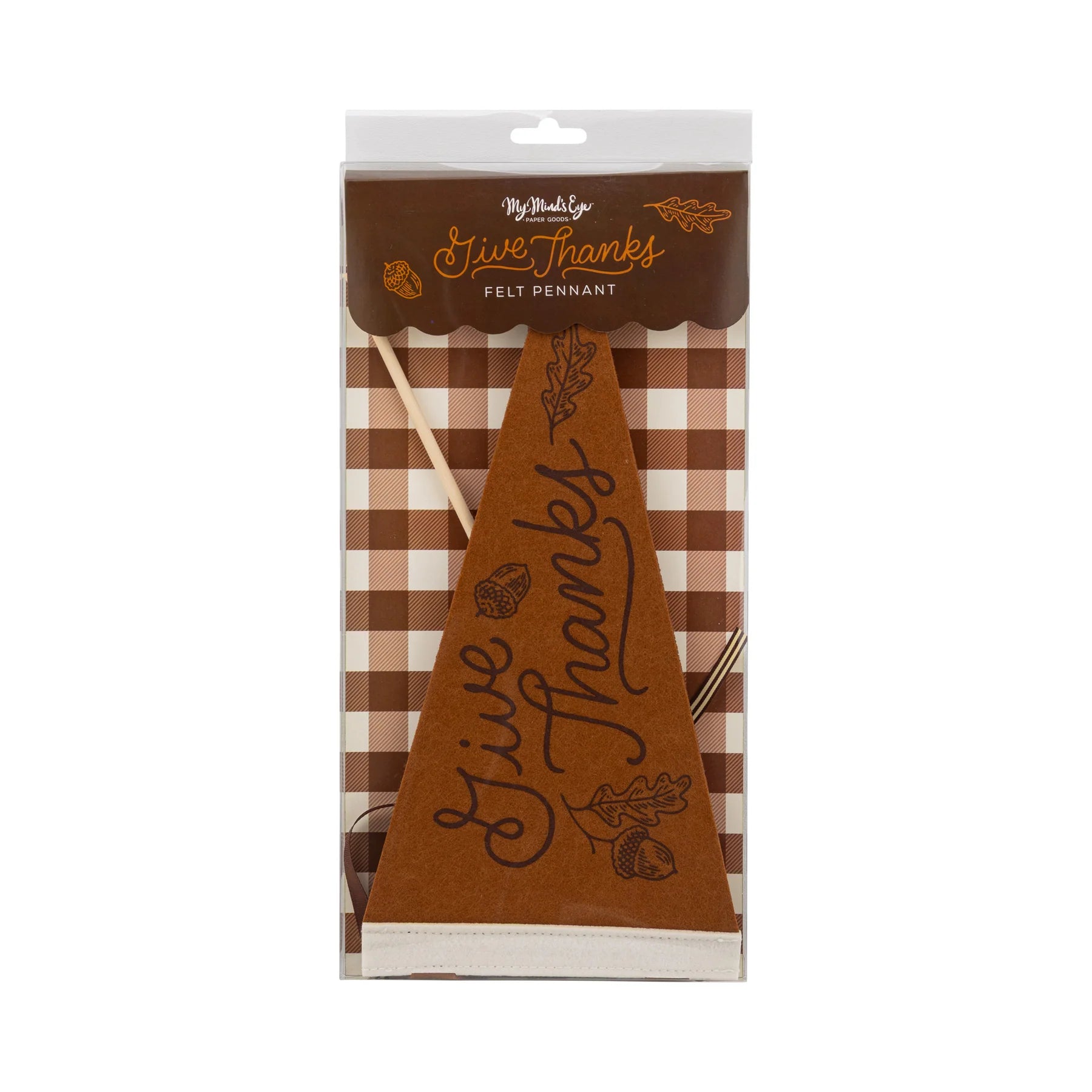 Close view of the brown felt Give Thanks pennant in a clear sleeve over a brown gingham backer.