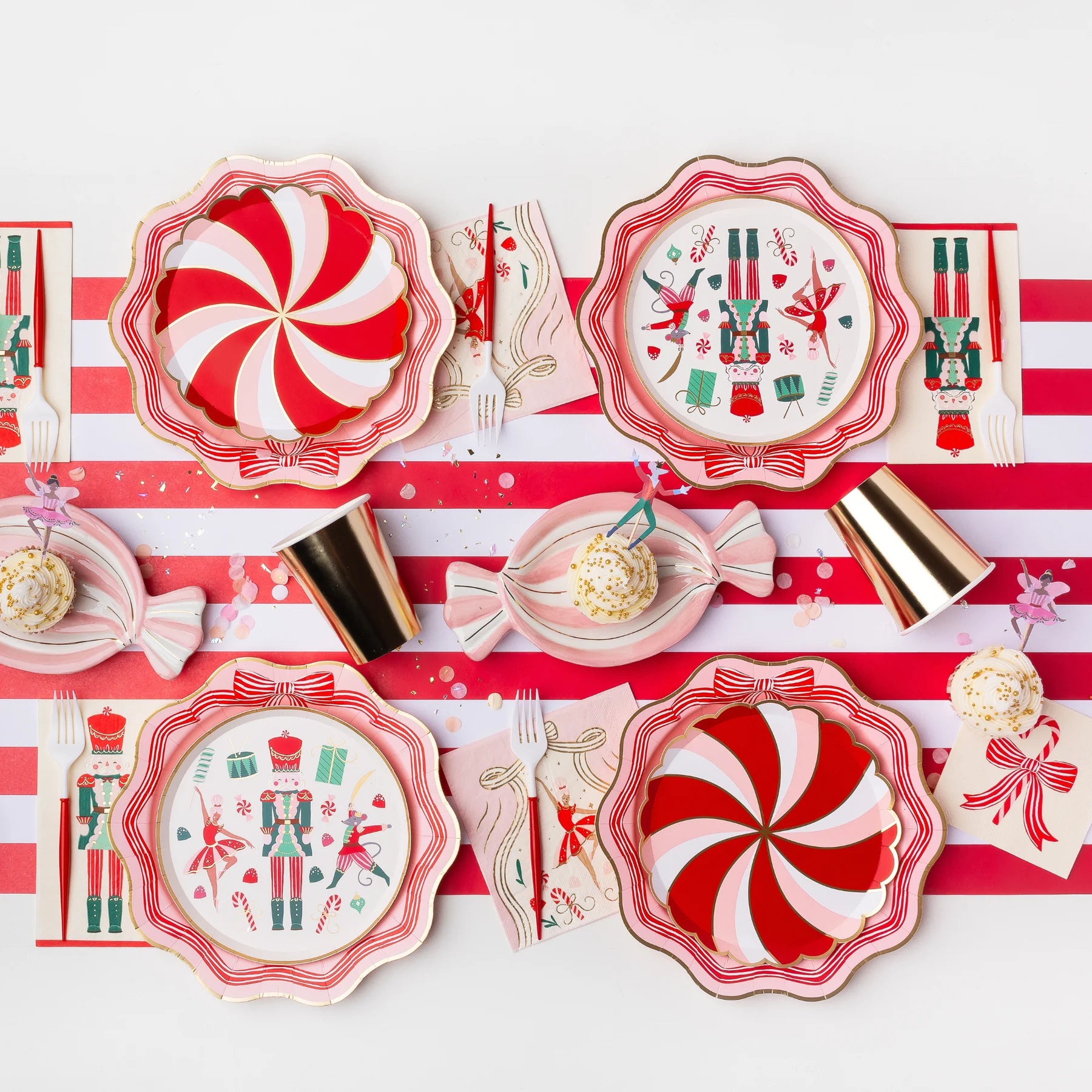 Holiday tablescape with peppermint plates and pink Sugarplum Fairy Christmas napkins for a nutcracker Christmas theme