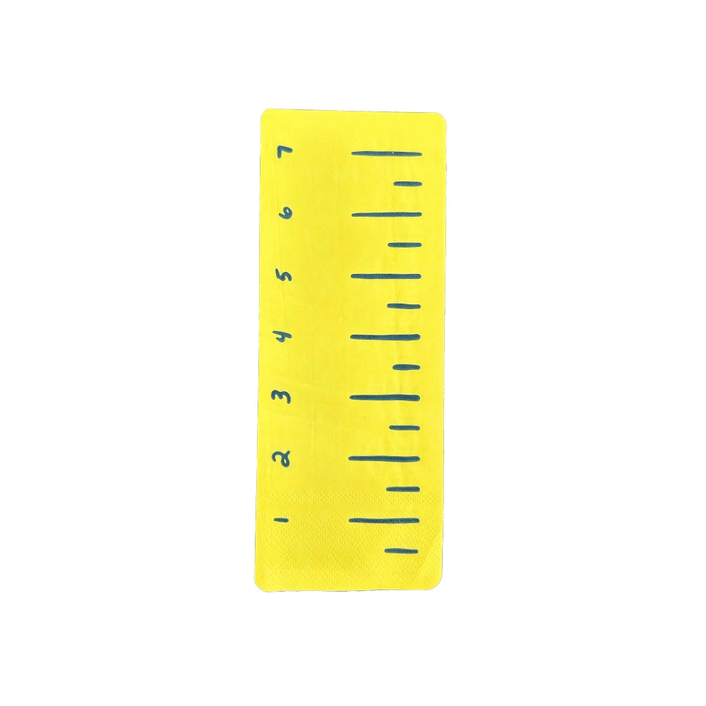 Close-up of single yellow ruler guest napkin on white background showing inch marks 1 through 7, ideal for back to school napkins collection	