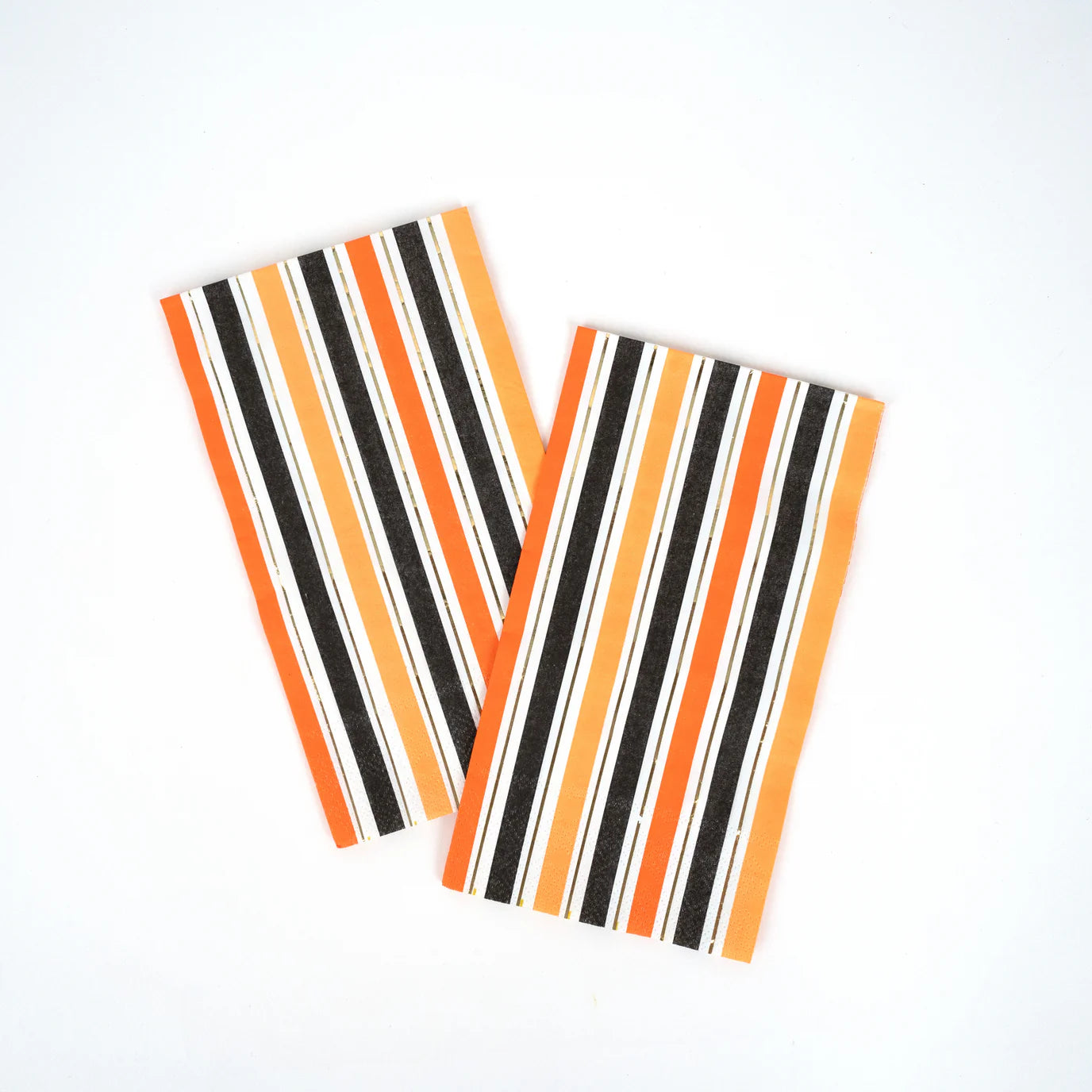 Two orange stripe halloween napkins shown flat on white