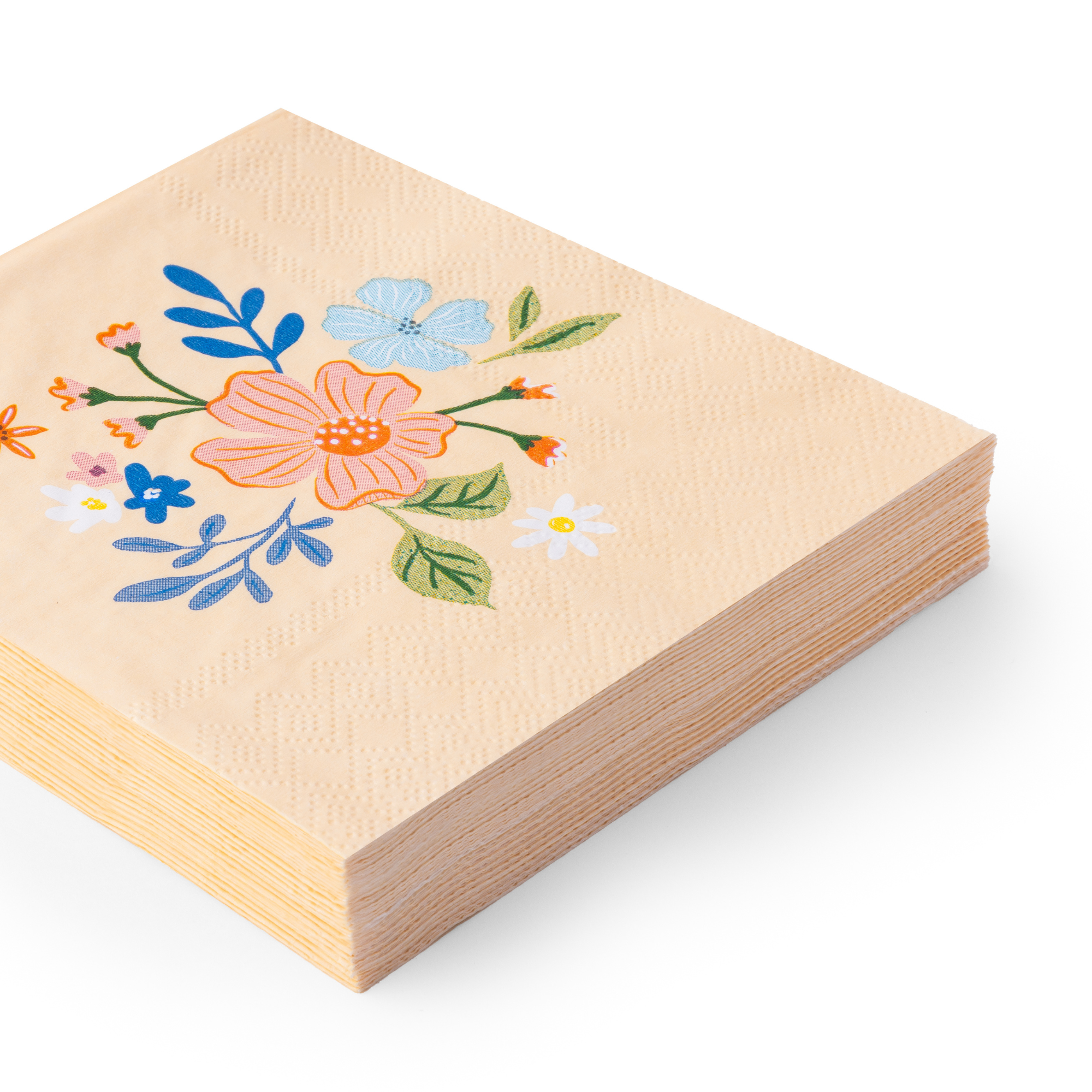 Stack of floral cocktail napkins with multicolor botanical print.