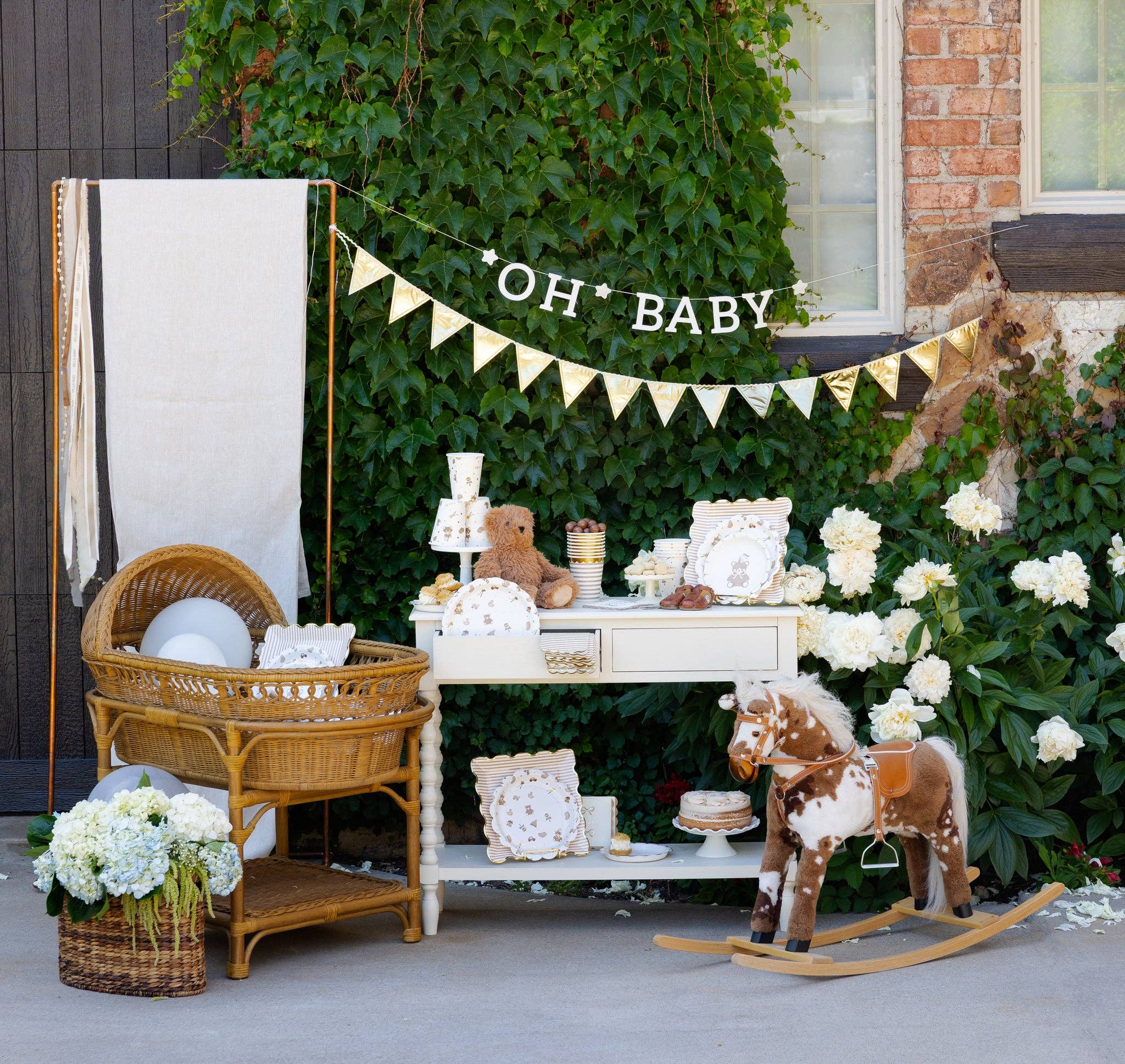 Oh Baby felt banner with gold pennant garland for baby shower decor