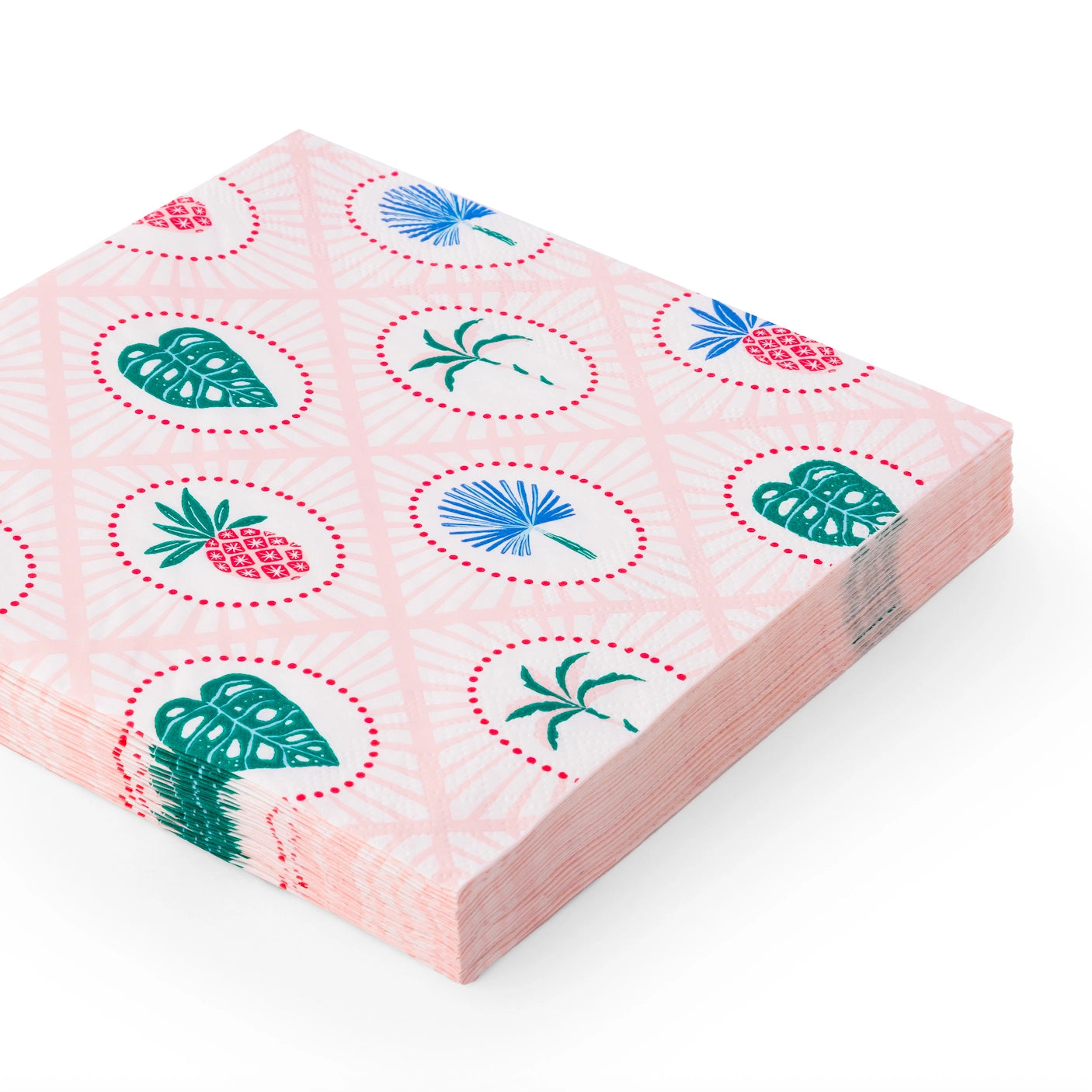 Angled stack of pink lunch napkins featuring tiny pineapples, monstera leaves, and palms.
