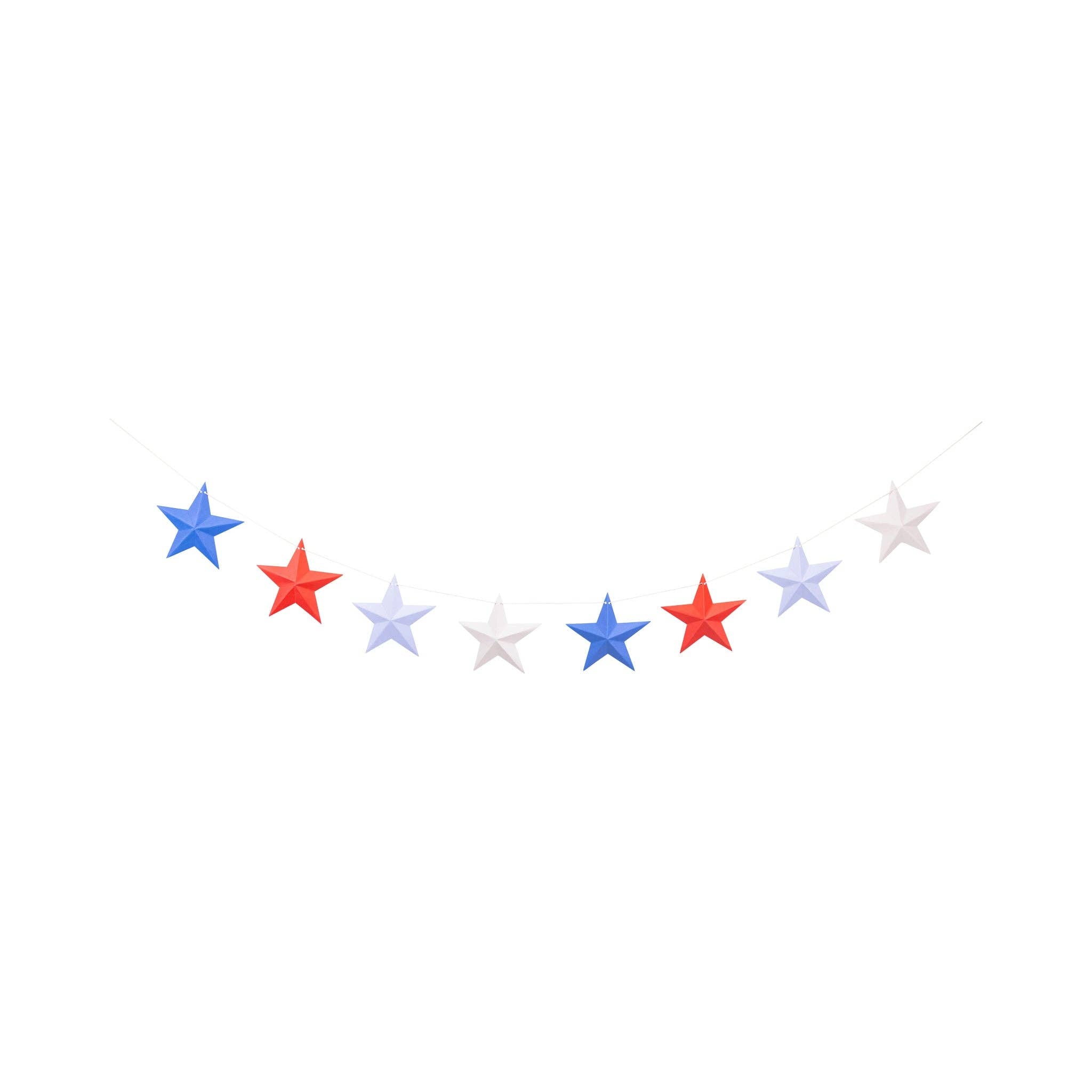 Seven folded 3D paper stars in red, blue, white, and light blue strung on cream twine against a white background