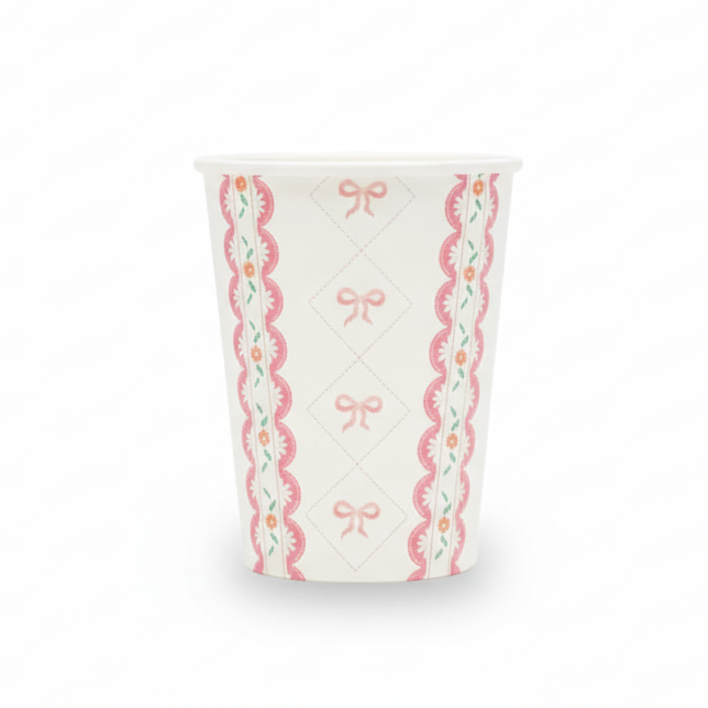 Single paper party cup with pink bow lattice and floral border pattern