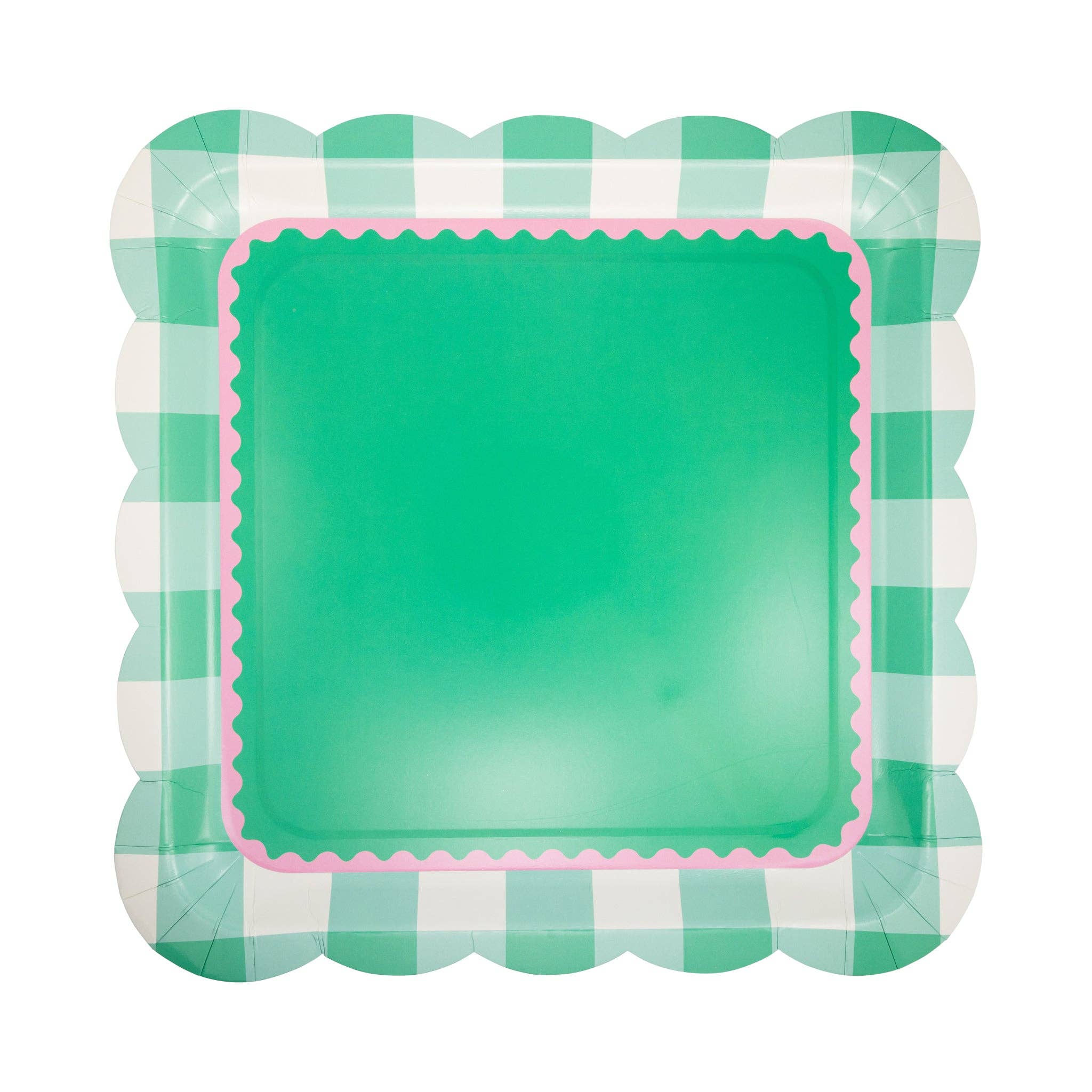 Pink and green gingham scalloped square paper plate on white background