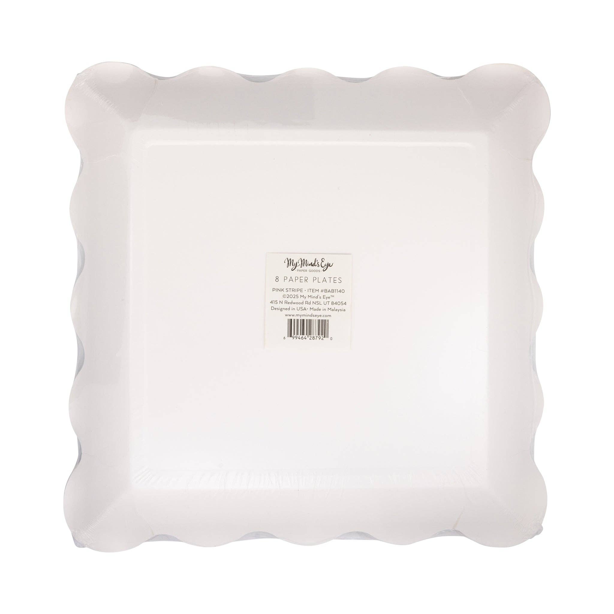Back view of disposable pink striped party plates in packaging