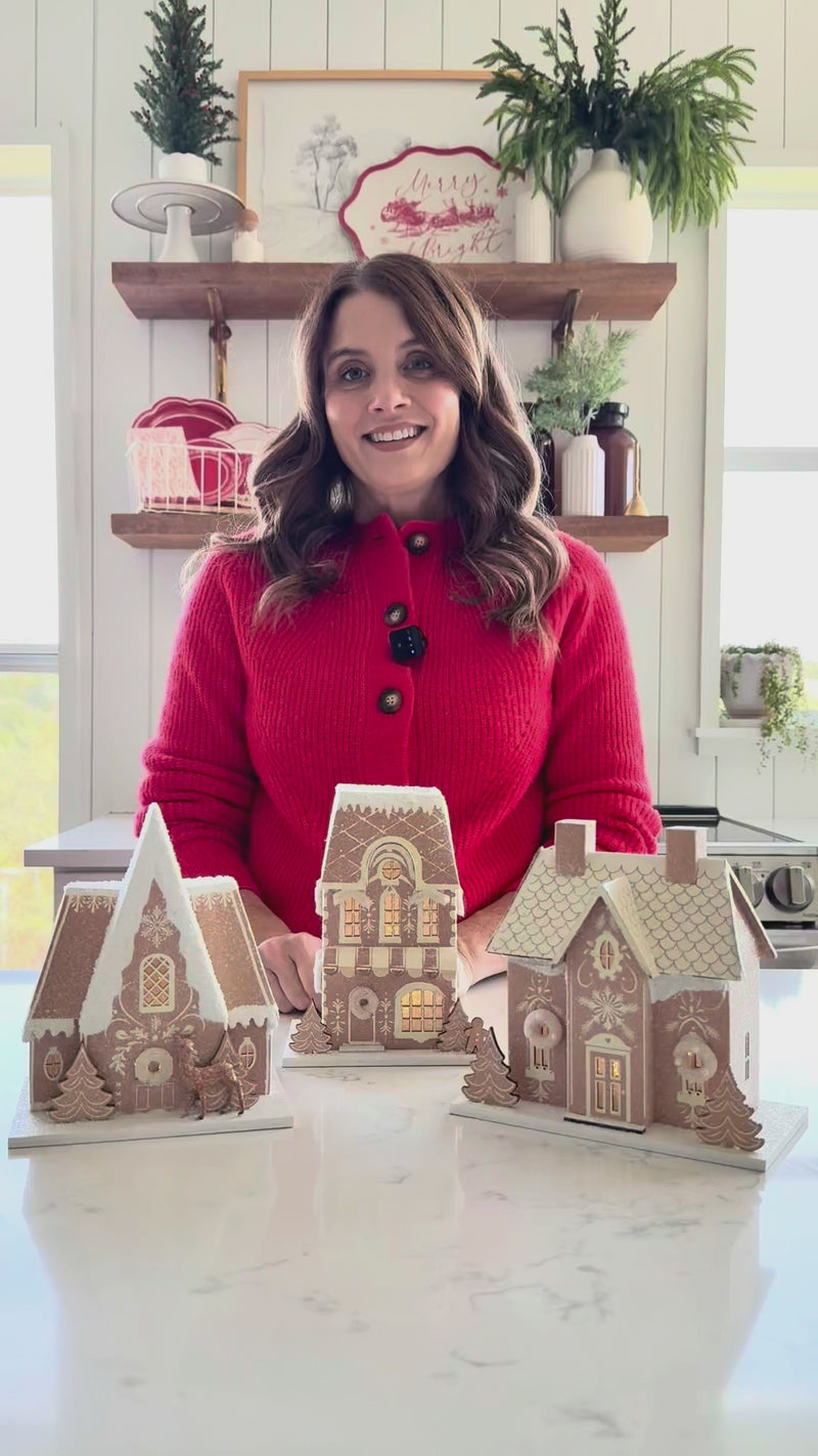 Video demonstrating the size of the Gingerbread Manor gingerbread house putz house and showcasing the full three-piece collection.