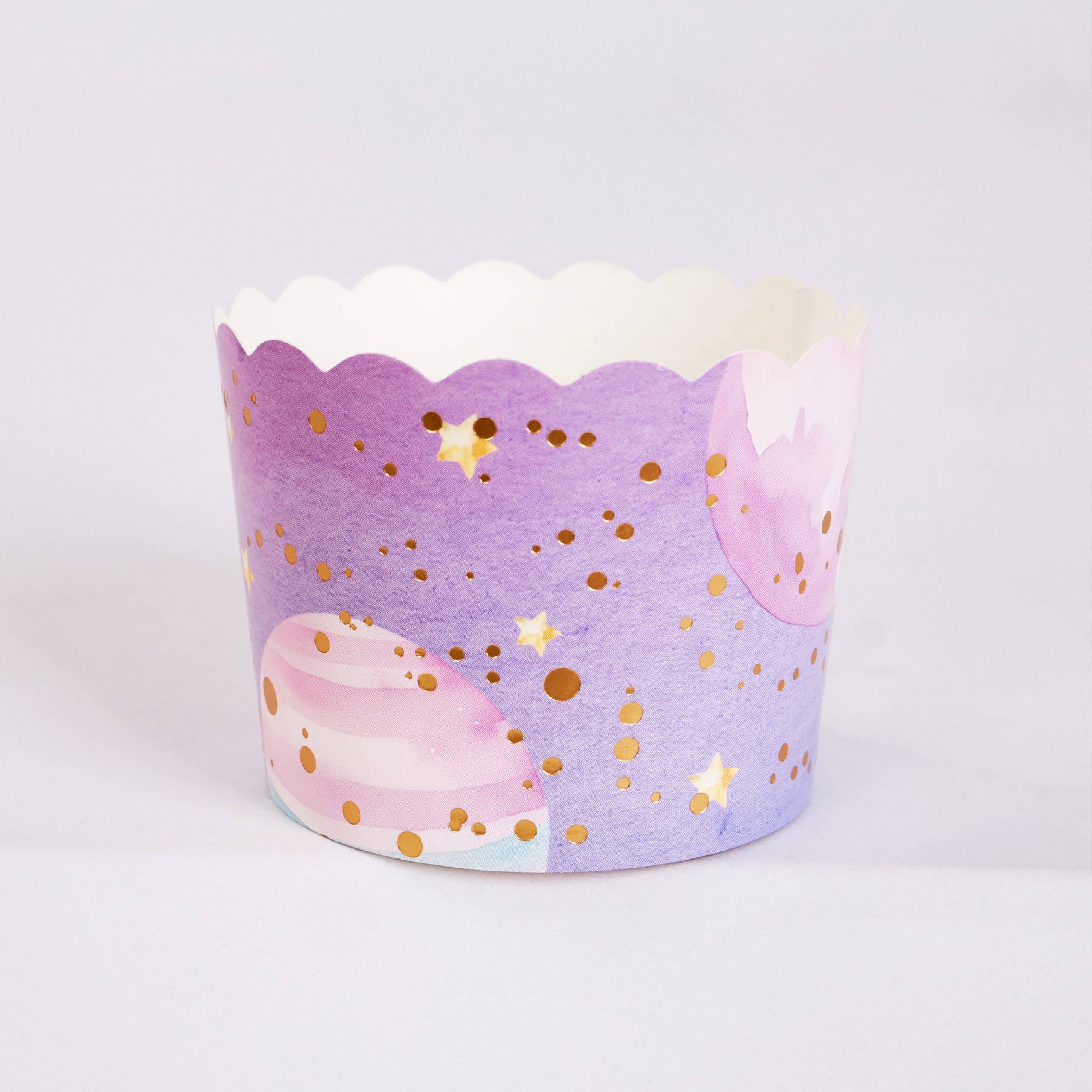 purple galaxy cupcake baking cup with planets and stars design