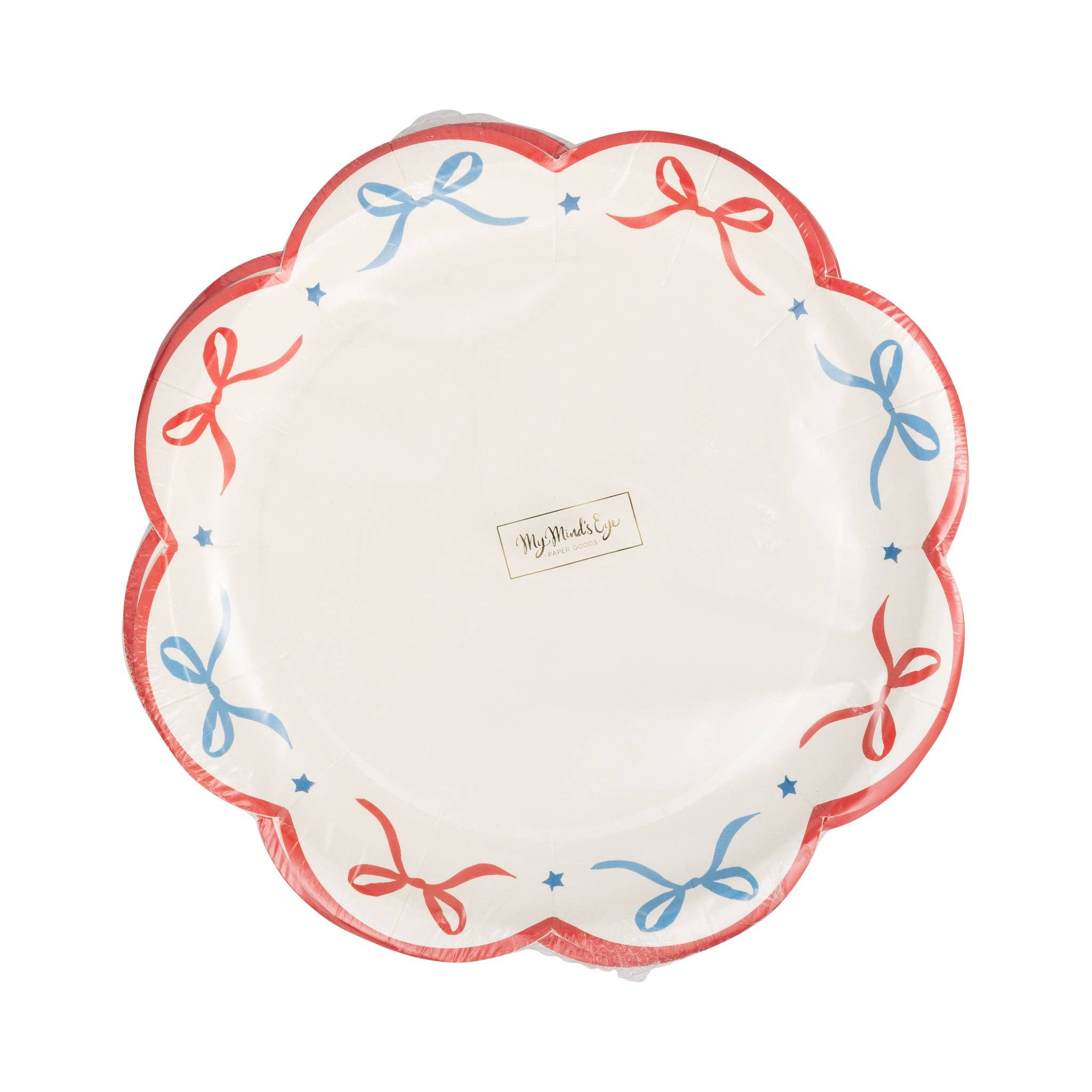 Front of red and blue bow scalloped paper plate showing alternating red and blue bows with small blue stars on cream background with red scalloped edge