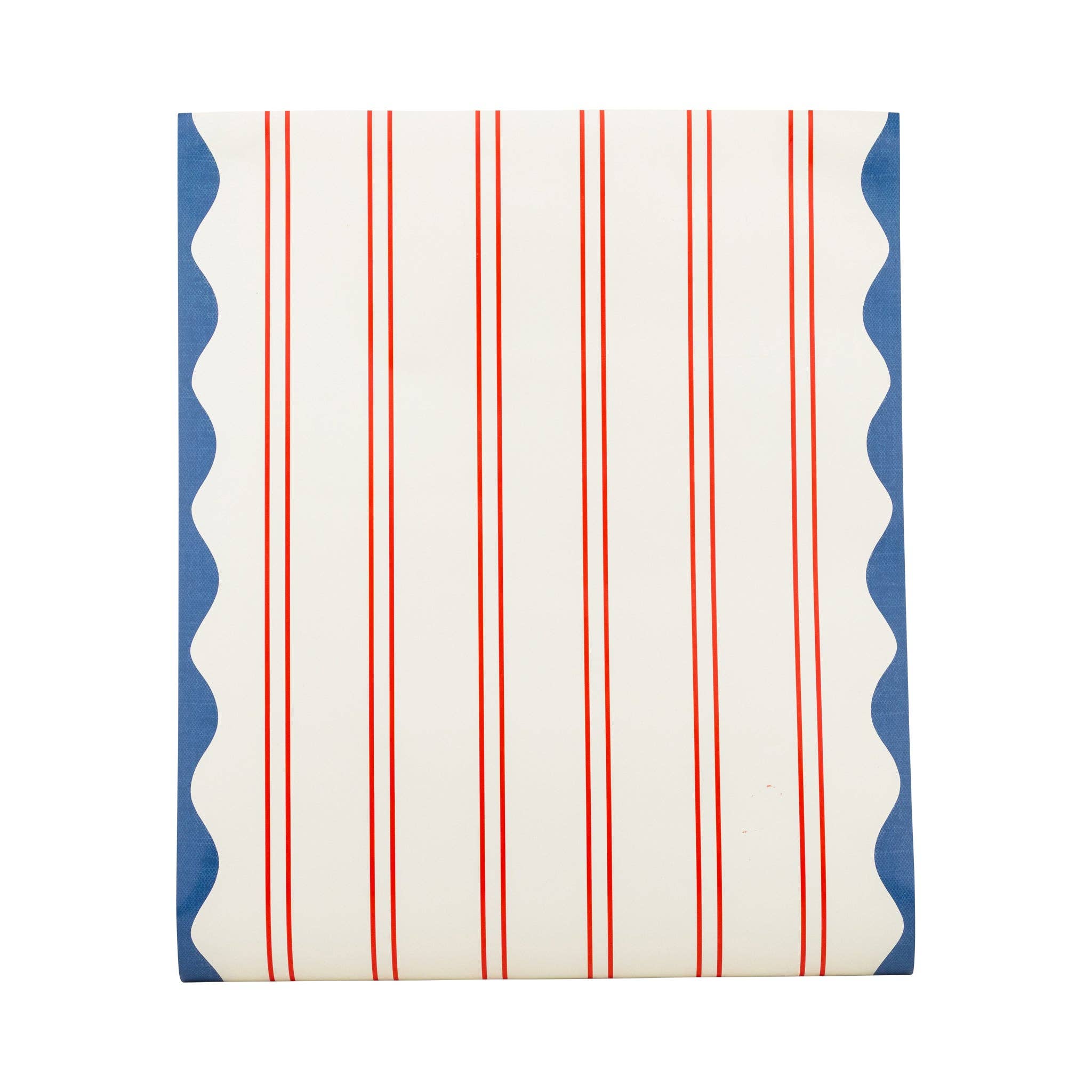 Flat lay of red striped paper table runner showing pinstripe pattern and blue wave scallop border on each edge