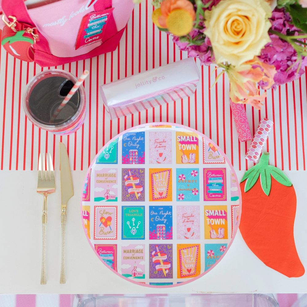 Romcom plate styled with flowers, drinks, and party table decor