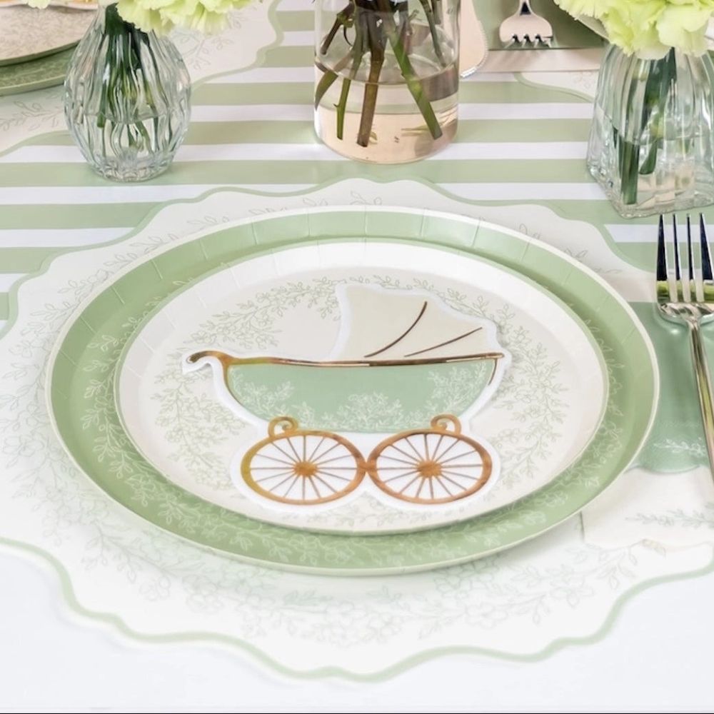 close up of sage placemat scalloped edge and floral detail.