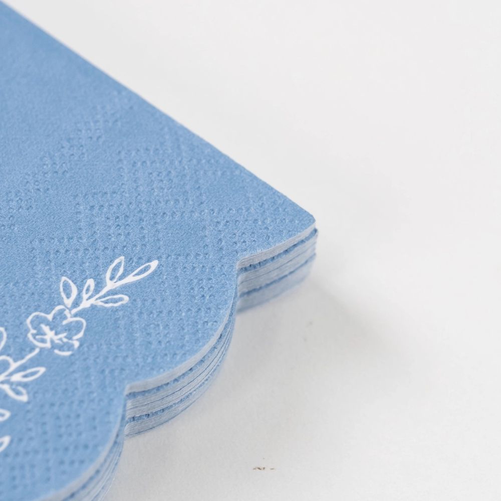 scalloped cocktail napkins blue edge detail
