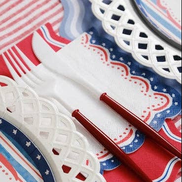Macro shot of the red, white, and blue scalloped trim on the Patriotic Guest Towels.