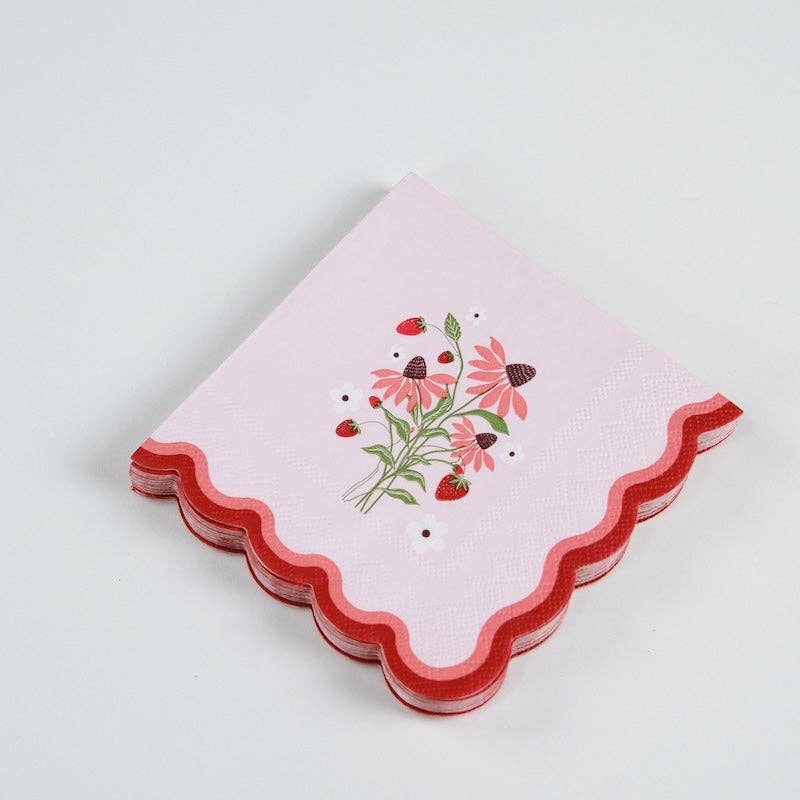 A stack of Strawberry Cocktail Napkins showing the die-cut wavy edge for a Boutique Aesthetic.