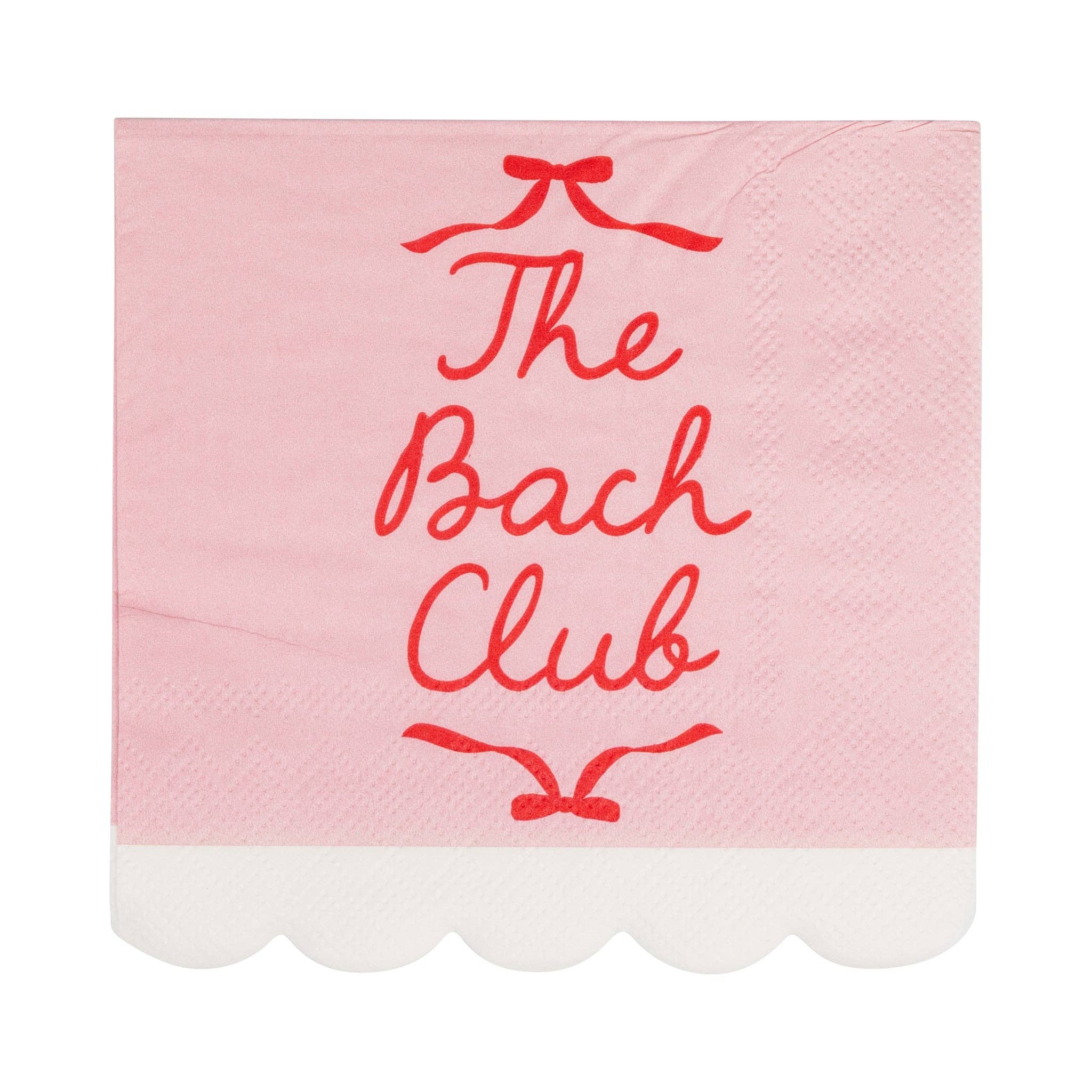 A close-up of a single Bachelorette Cocktail Napkin showing the scalloped white edge and red script.
