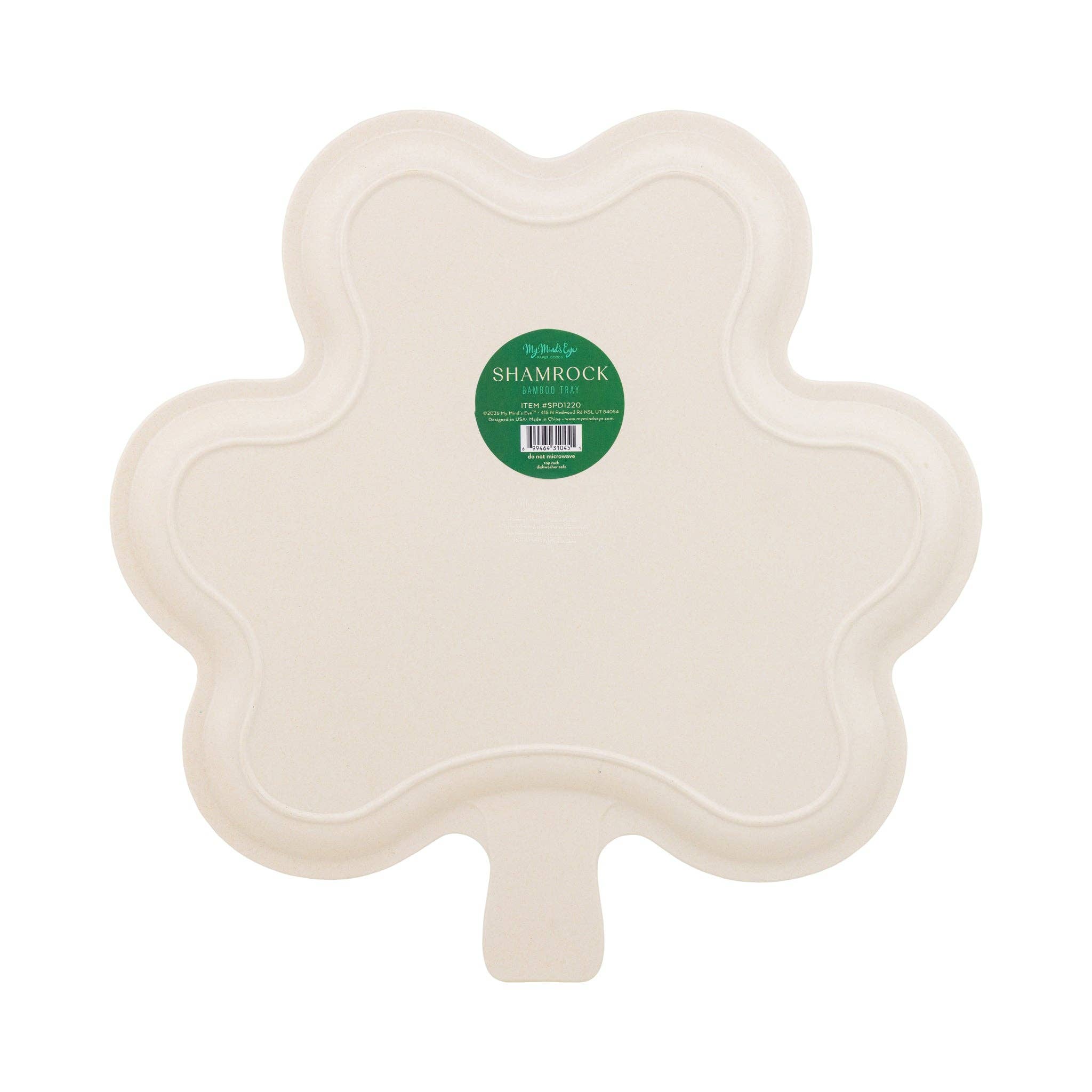 Back view of shamrock-shaped bamboo fiber serving tray in packaging