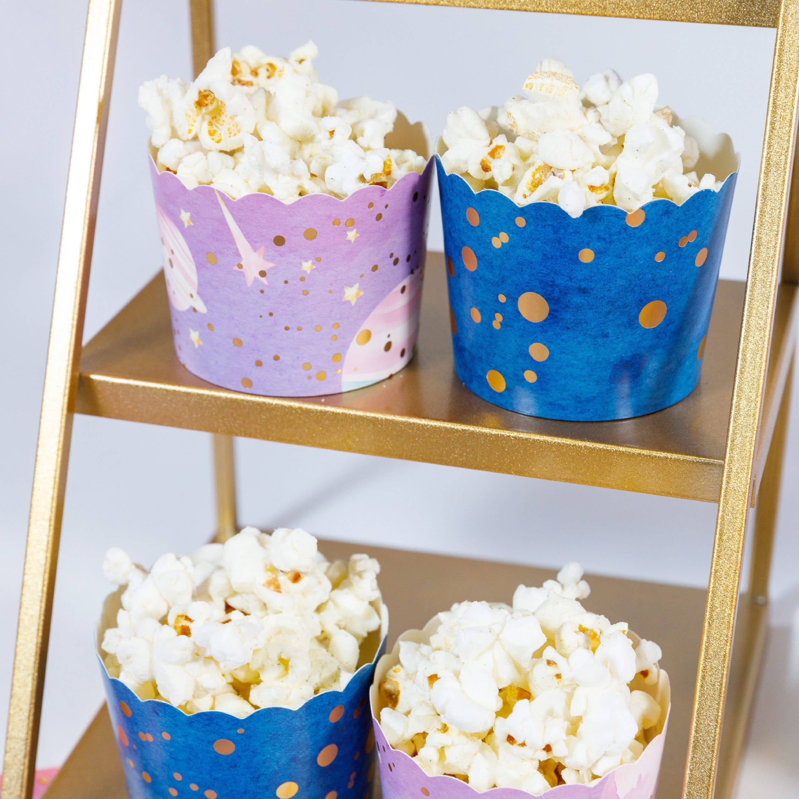 popcorn cups in space theme with blue and purple galaxy design
