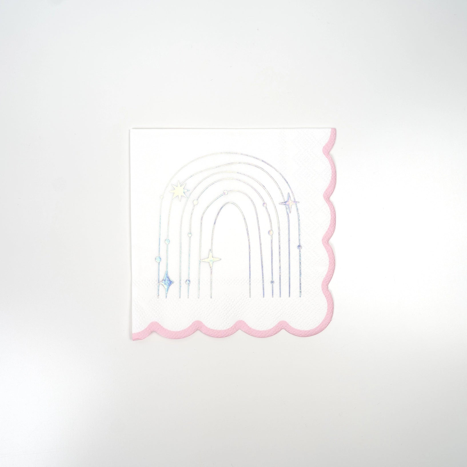 Product cutout: sparkle rainbow beverage napkin with holographic foil and scalloped pink edge.