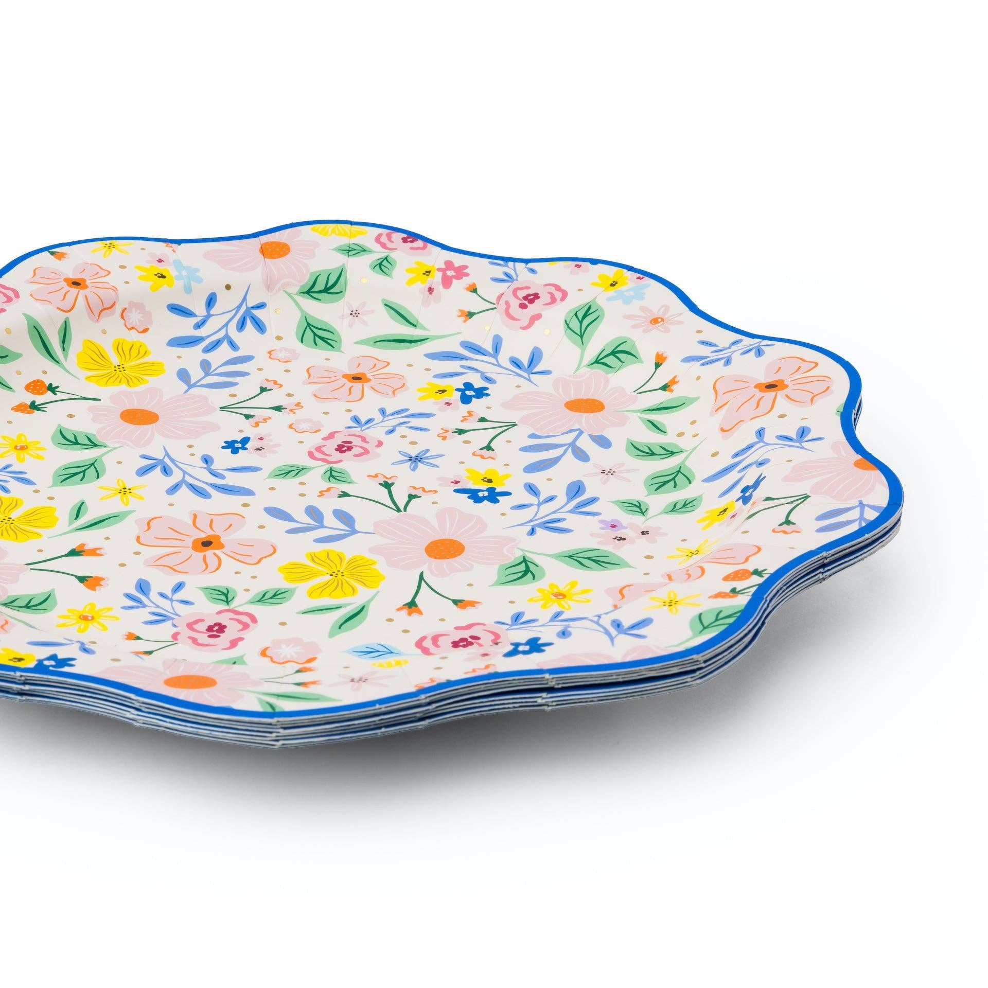 Stack of multicolor floral paper dinner plates with scalloped edges.