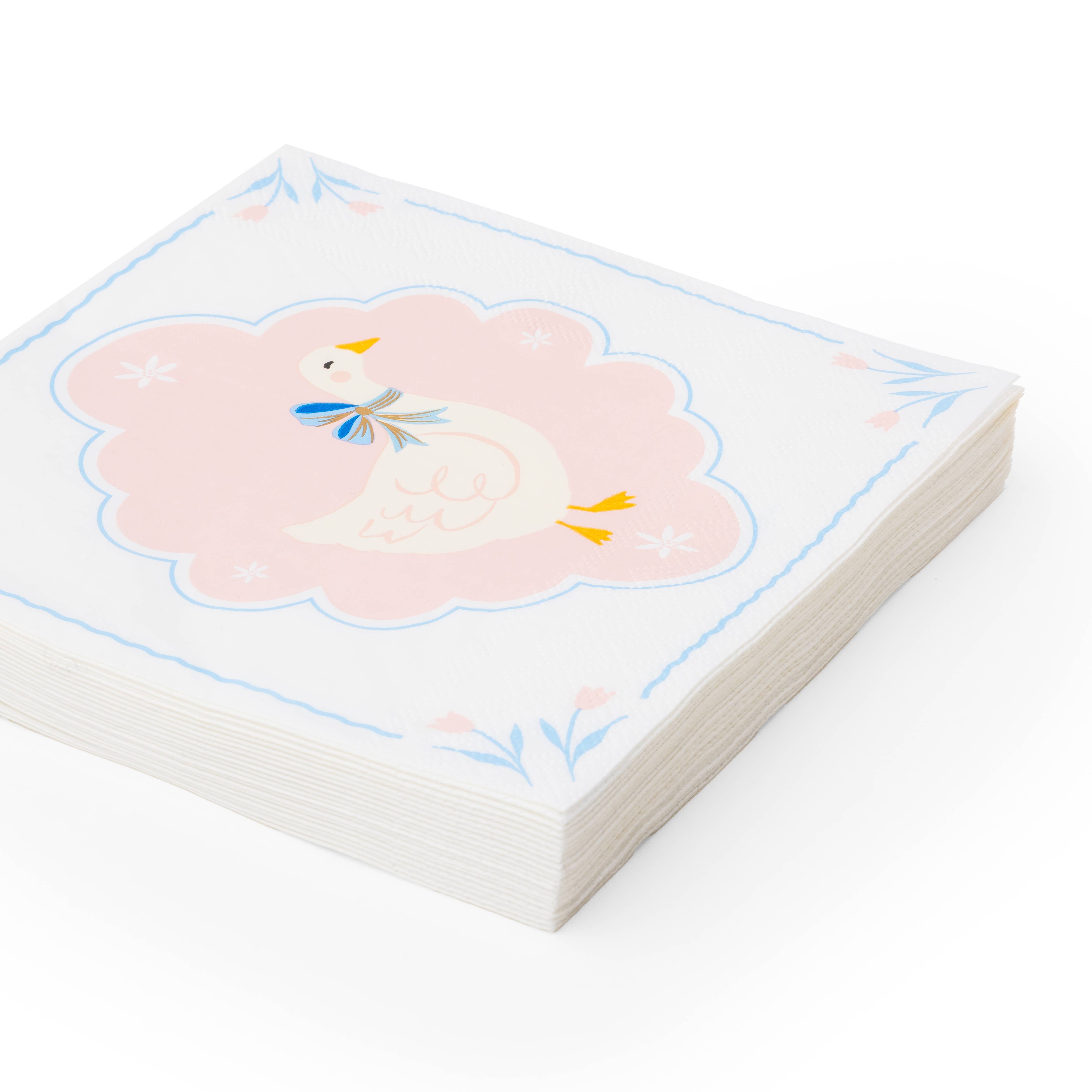 Stack of sweet goose large napkins with pink and blue floral border