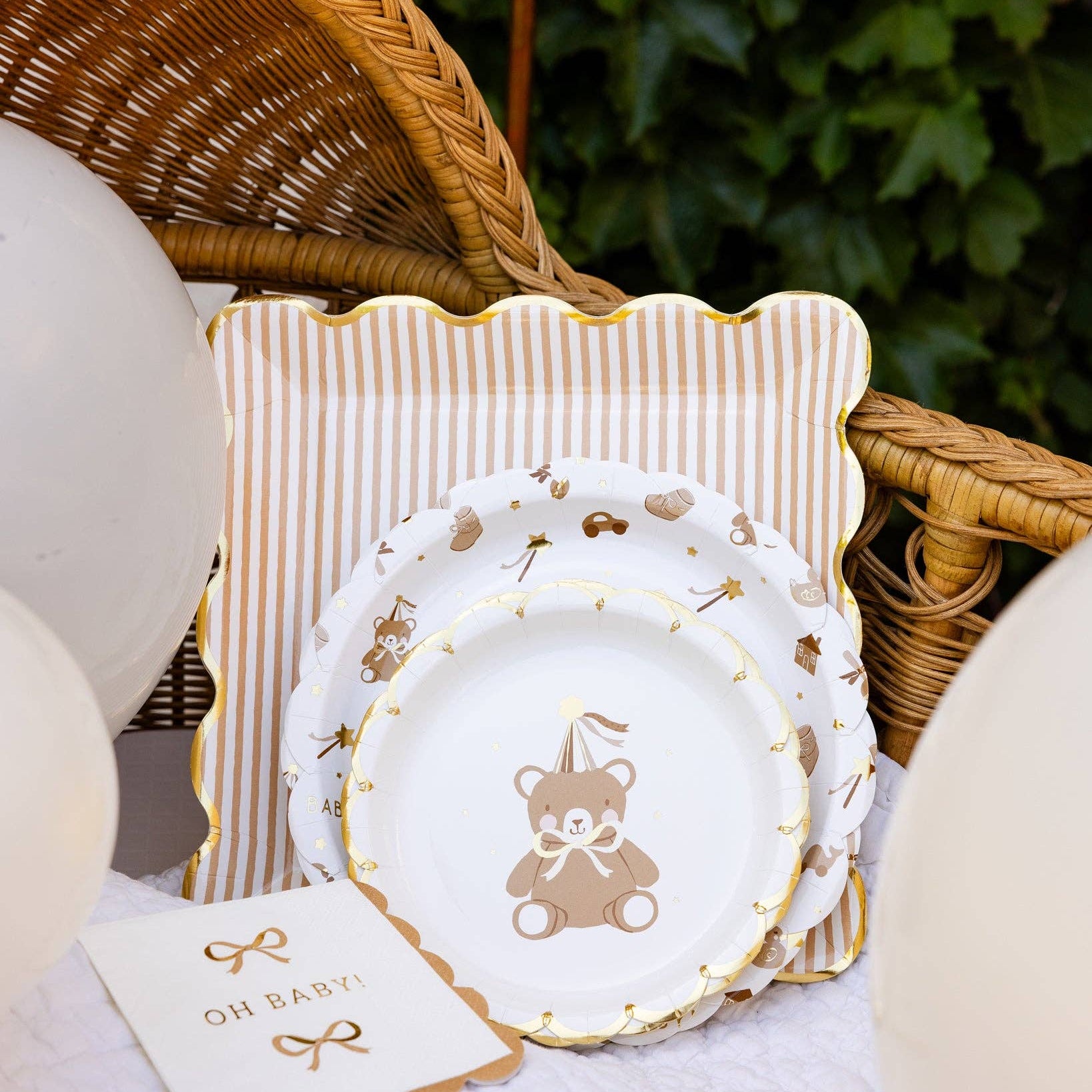 Tan striped square plate displayed with teddy bear baby shower plates