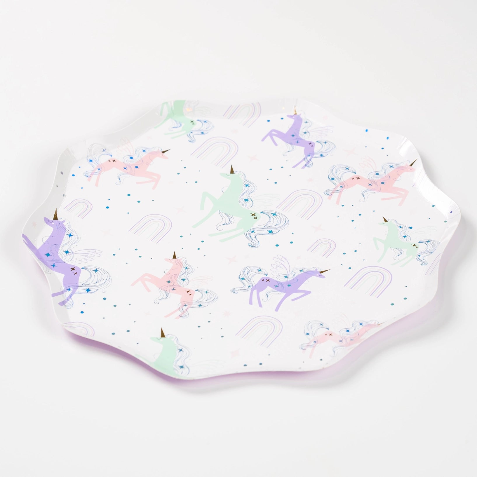 Full plate with all-over pastel unicorn pattern and confetti dots.