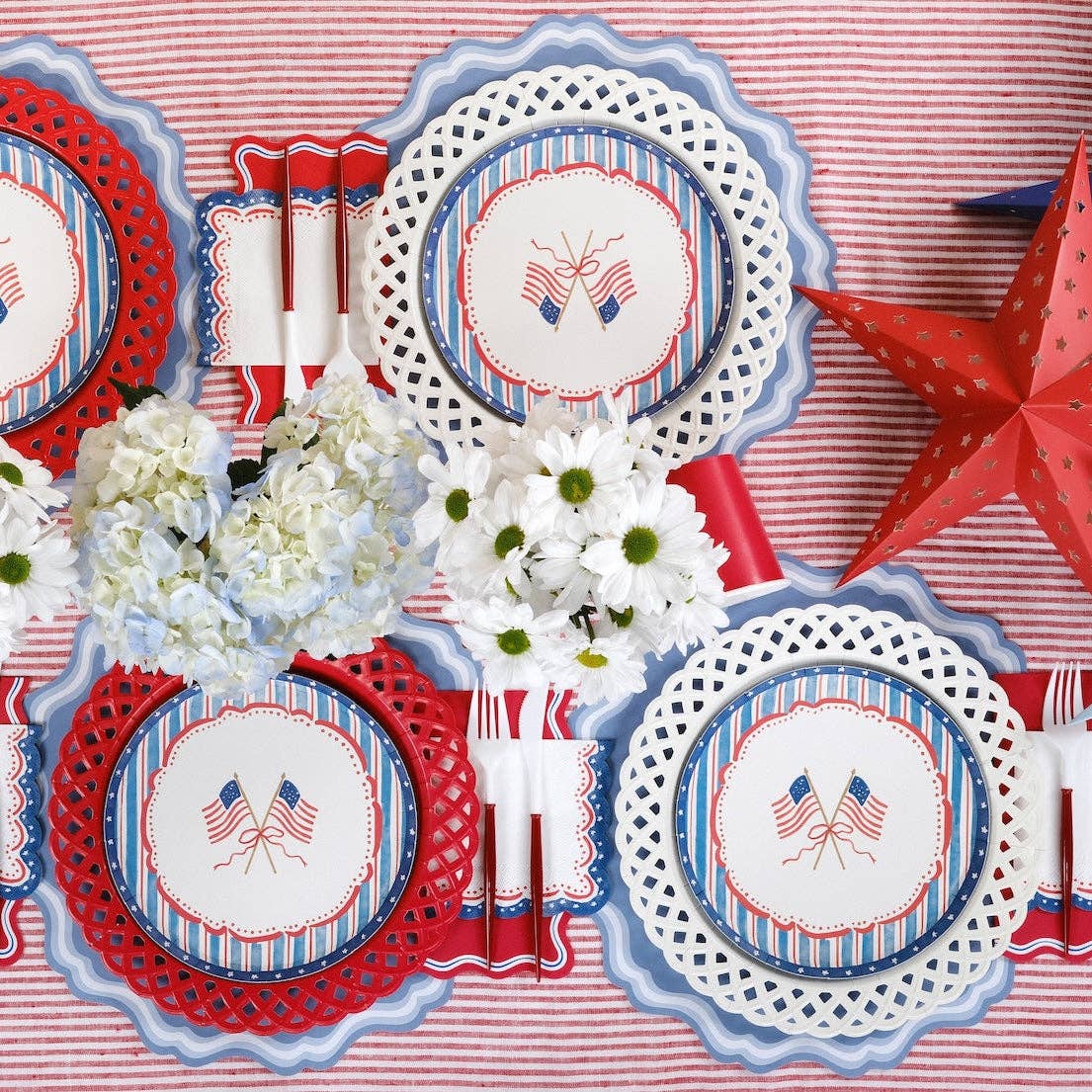 A tiered Independence Day Brunch Decor setup featuring Patriotic Dessert Plates and red star accents.